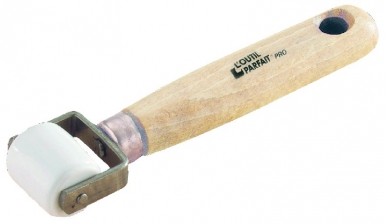 Roulette colleur professionnelle - fût ébonite - manche bois. disponible abidjan cote d'ivoire.